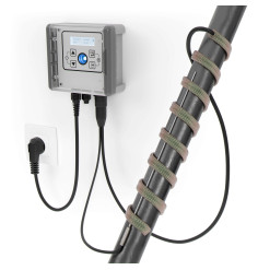 Installation professionnelle câble chauffant 100W/m sur tuyauterie de gros diamètre.