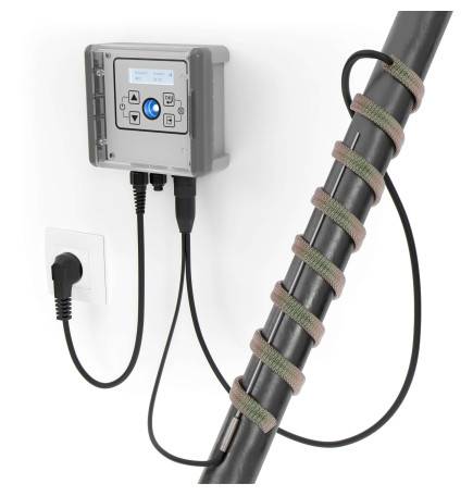 Installation professionnelle câble chauffant 100W/m sur tuyauterie de gros diamètre.